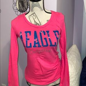 Bright pink long sleeve top